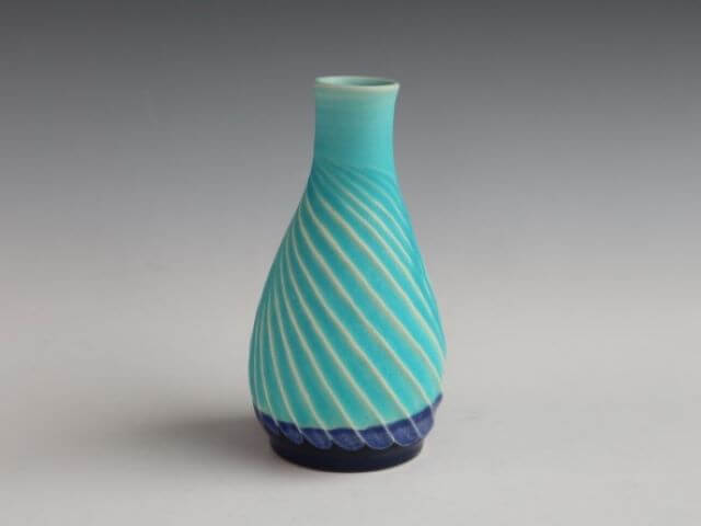 Sea blue glaze engraving tall foot vase