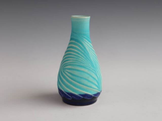 Sea blue glaze engraving tall foot vase