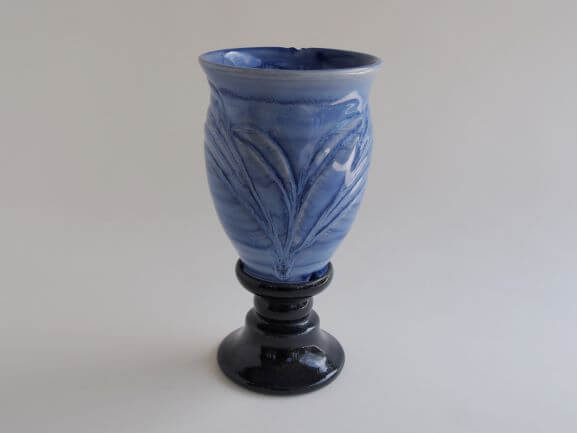 Sea blue glaze engraving tall foot vase