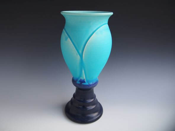 Sea blue glaze engraving tall foot vase